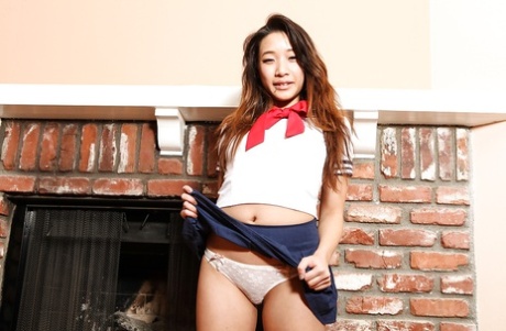 Glorifying amateur Asian girl, Meiko, looks like a mischievous schoolgirl.