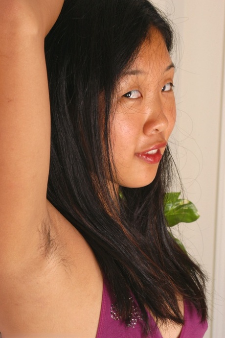 Amateur Asian babe Janet with hairy pussy and tiny natural tits