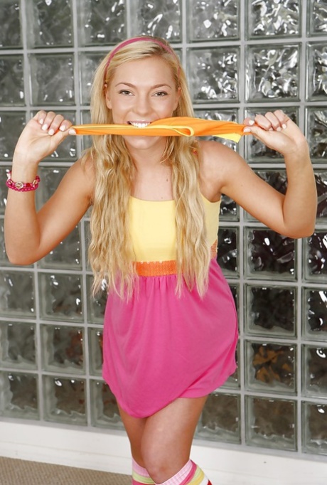 Ally Kay, the brunette pornstar known for her sexy blonde appearance, is seen wearing provocative socks.