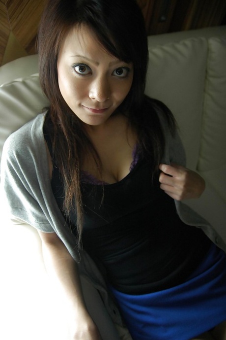 Looking great: Asian brunette Kazumi wants to show off her amazing pussy and oran.