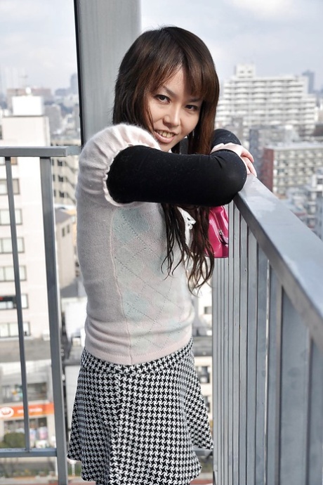 Yoshie Kiyokawa is a delightful Asia female who spreads her legs wide.