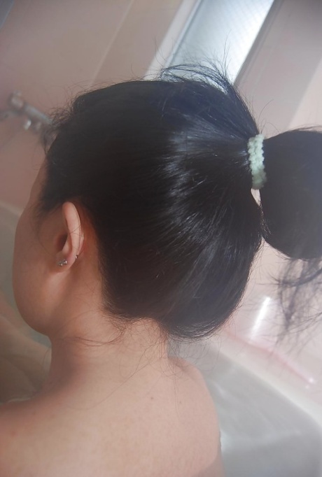 Asian chick with a hairy pussy Kanae Hiyama takes a hot bath