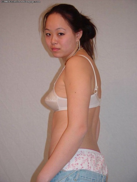Asian teenager China is getting naked and playing with toys!