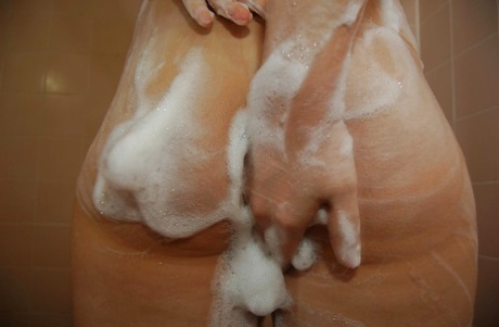 In her hairy pussies and natural tits, Ayumi Shoda, an Asian kitten named Ayumi, is washing herself.