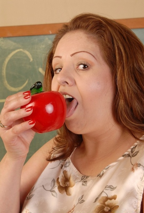 Cyn, the lively and mature teacher, exhibits her impressive big juicy booty.