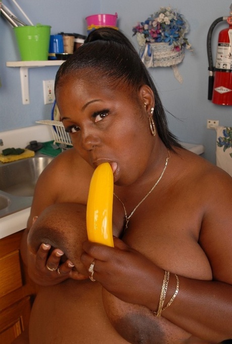 The beautiful yellow sextoy Subrina, with its juicy ebony coloration, is enjoying a playful moment.
