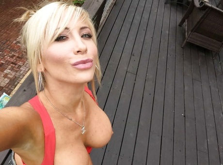 Big-tit blonde Tasha Reign is making hot topless selfies on cam