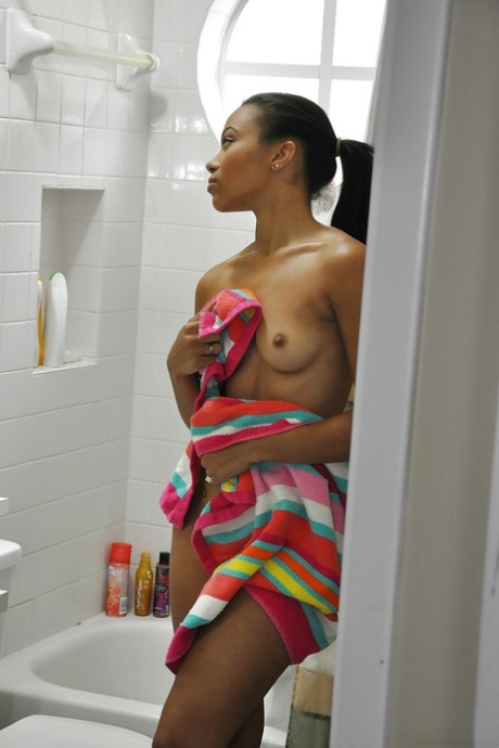 Ebony Adrian Maya Undressing And Taking Shower In Voyeur Scene