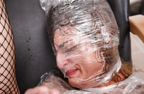 Hungry milf Klarisa Leone gets wrapped by plastic bag and fucked