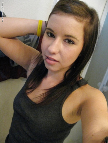 Young vixen Becka takes a few shots of her ample ass and her soft tits 22875452