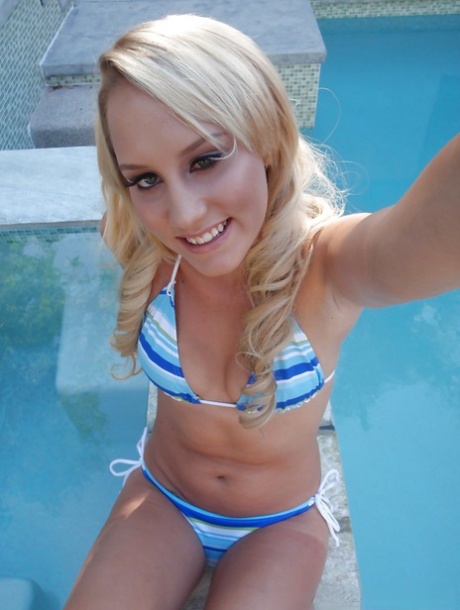 Relaxing by the pool amateur teen Liyla made some enticing photos