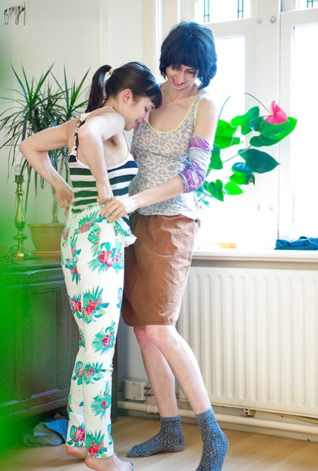 A lesbian amateur couple, Lulu and Salma, are dressed in a horned-out appearance.