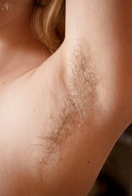Blonde amateur Laney taking off clothes and to bare hairy armpits hd pic #5