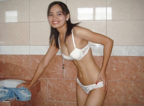 After a small Thai girl's first experience, she claims to have shot herself before stripping naked in the bathroom.