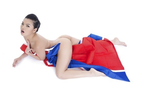 A naked photo of top-heeled Asian glamour model Cindy Starfall, who chose to wear only boots.