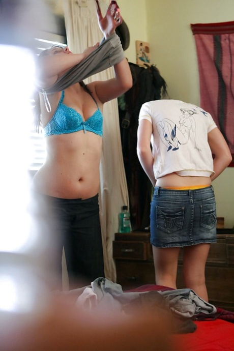Slutty lesbian teens Greta and Jamie Lee helping each other get dressed - PornHugo.net