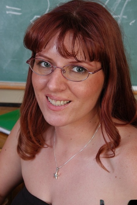 Large natural tits are being exposed in classrooms by the mature schoolteacher Tru.