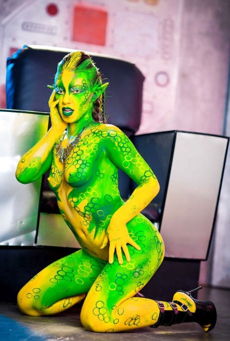 Kinky Cosplay Chick Tiffany Doll Posing In Body Paint Uniform And Spreading