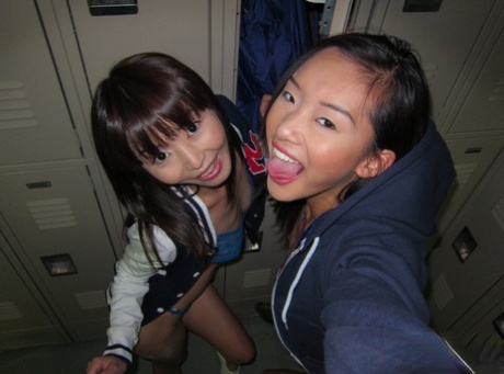 Young Asian amateur Alina Li and friend flashing flat chests in change-room