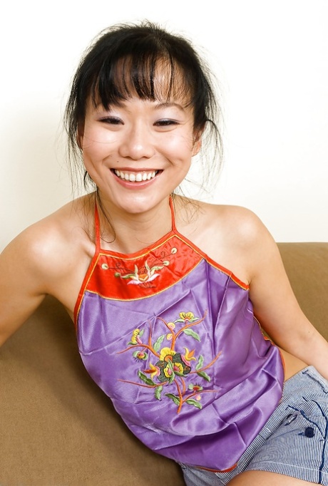 First-time Oriental dancer Niya Yu displays attractive MILF breasts.