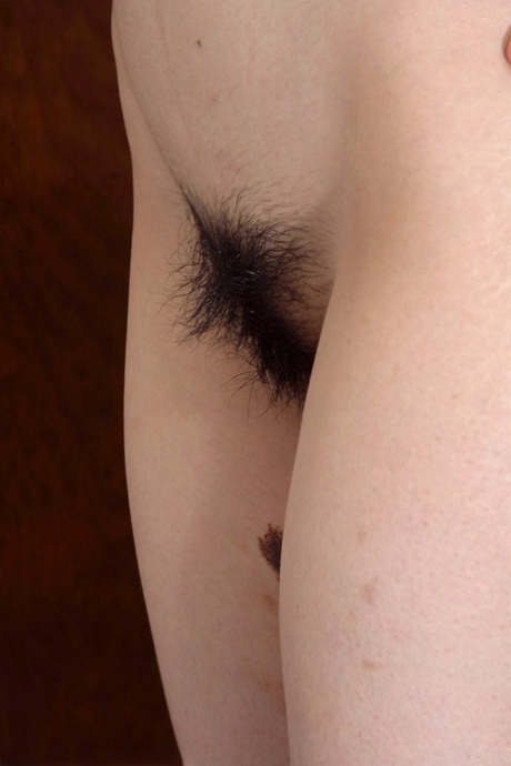 In Japan, Tiffany is a small amateur who removes her clothes for a hairy vagina experience.