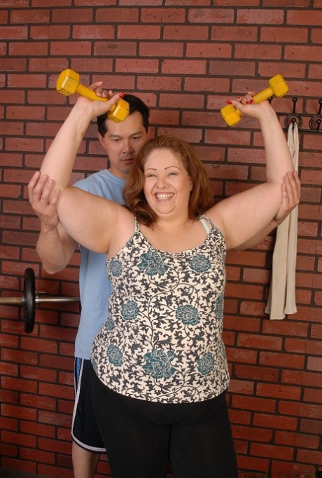 An obese granny Cyn removes her clothing after exercising to stimulate the vagina and perform oral sex.