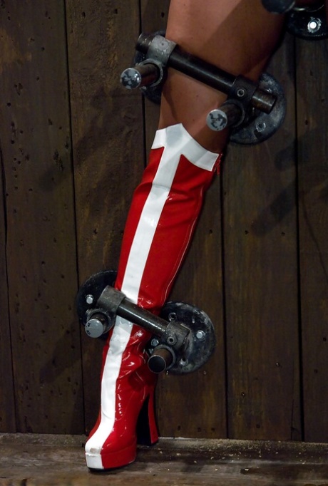Wonder Woman is depicted on kinky Device Bondage pornographic footage, with Christina Carter as the actress.