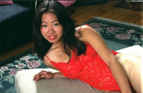 The first Asian to try it out, Ivy uses her lingerie to expose her hairy vagina.