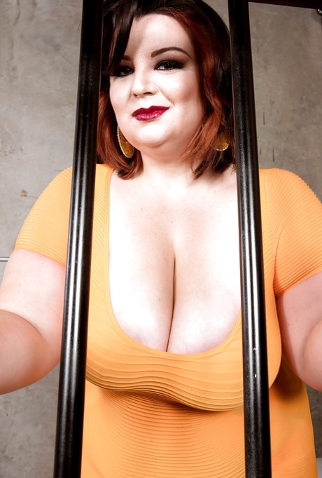 Brunette BBW Lucy Lenore Frees Huge Knockers For Nipple Play In Prison Cell