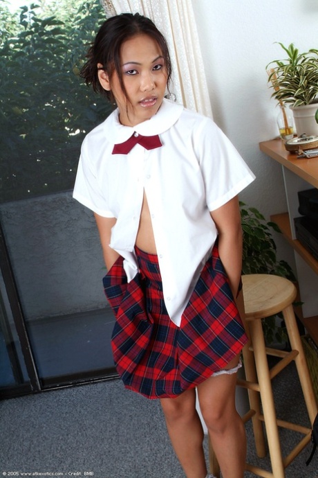 Amateur Asian babe flashing small teen schoolgirl breasts and underwear