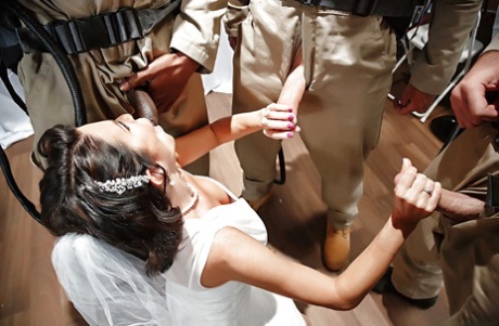 New army bride Veronica Avluv was photographed in an interracial group during her wedding night.