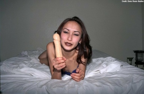 Petite Asian Amateur Tina Playing With Large Dildo On Bed In High Heels