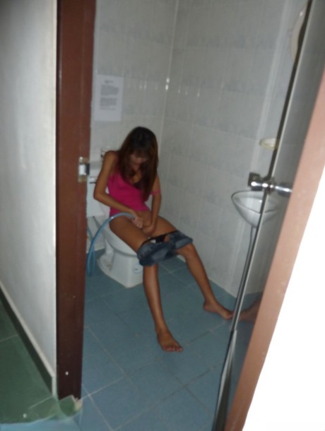 A Thai woman named Pak is splaying her hair for penetration after giving the tugjob.