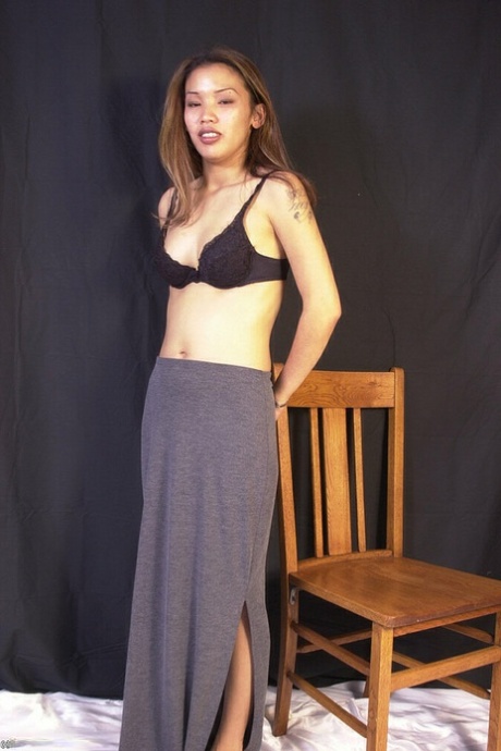 A naked modeling show featuring an Asian contestant named Nina who was peeling off her long skirt.