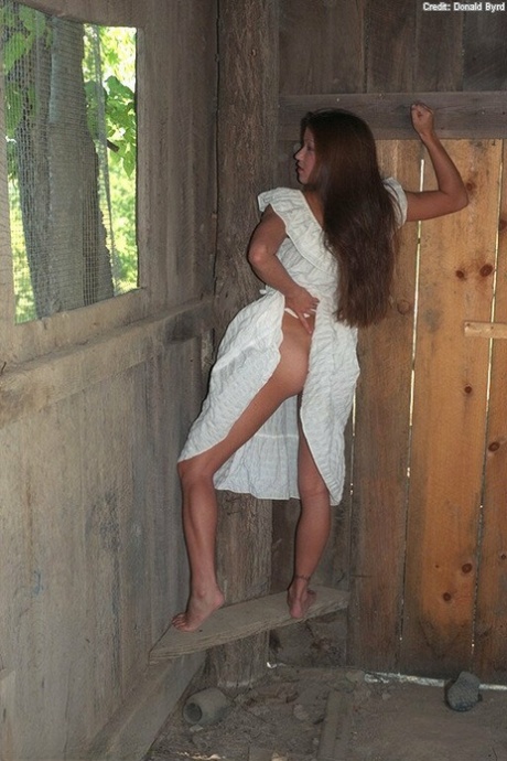 An Asian amateur, Lindsay masturbated in the woodshed after stripping.