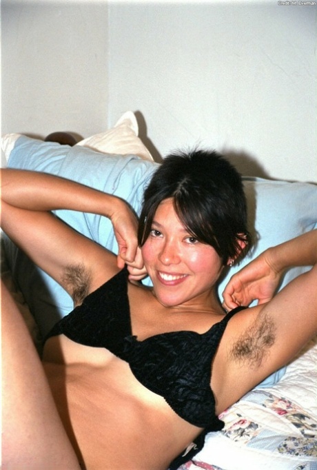 Asian amateur Amanda showing off fur covered underarms before baring beaver