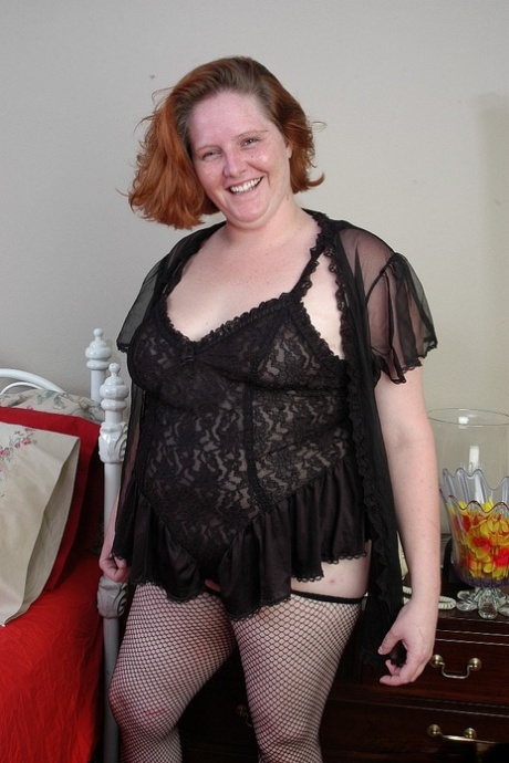 Fat older lady Adrienne strips off lingerie before inserting huge dong in cunt