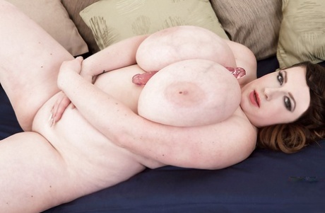 Prior to masturbation, European BBW Anna Beck releases massive breasts.