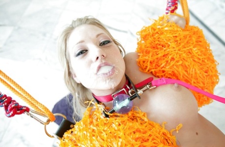 Cheerleading: Shawna Lenee gets sucked while being tied up with tons of suspended sperm.