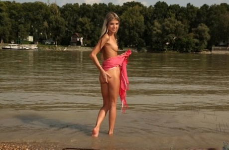Slender Solo Model Gina Gerson Slowly Removing Bikini And Towel On Rocky Beach
