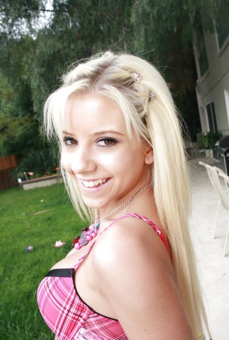 Tiny blonde teen Tessa Taylor revealing nice tits and tit ass on lawn