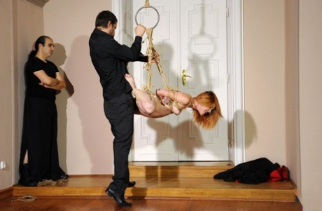 The use of Amarna Miller as a slave by 2 guys during the BDSM sex games was documented in Redhead.