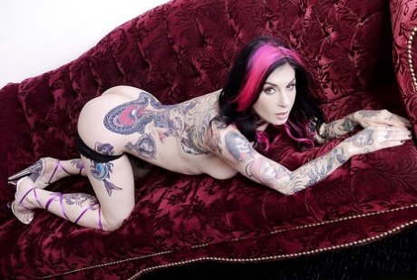 Heavily tatted MILF Joanna Angel peeling off bra and panty set to model naked