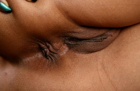 Short Haired Black Woman With Pierced Nipples Tries Her Hand At Nude Modeling