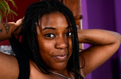 Ebony amateur Janelle Taylor bares her breast as she gets naked again.