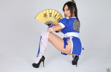 Asian Solo Model Releases Her Big Tits From Her Cosplay Costume