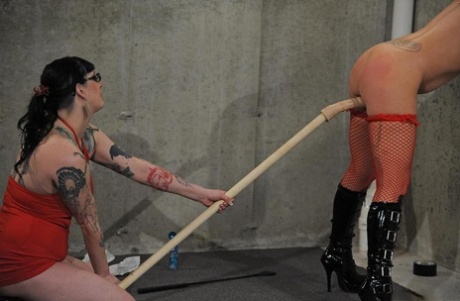 To spice up their sexual experience, lesbians play kinky lezdom in a basement dungeon.