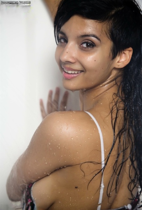 Indian Solo Girl Takes Off Her Wet Dress To Pose Nude In The Bathtub