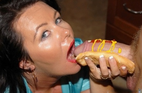 A special hotdog with a huge bulging sausage is provided for lunch at BBW MILF.