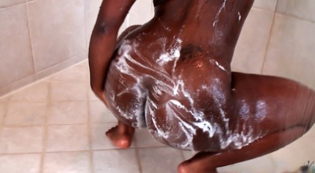 Nasty Black Girl Washing Her Juicy Curves In The Shower